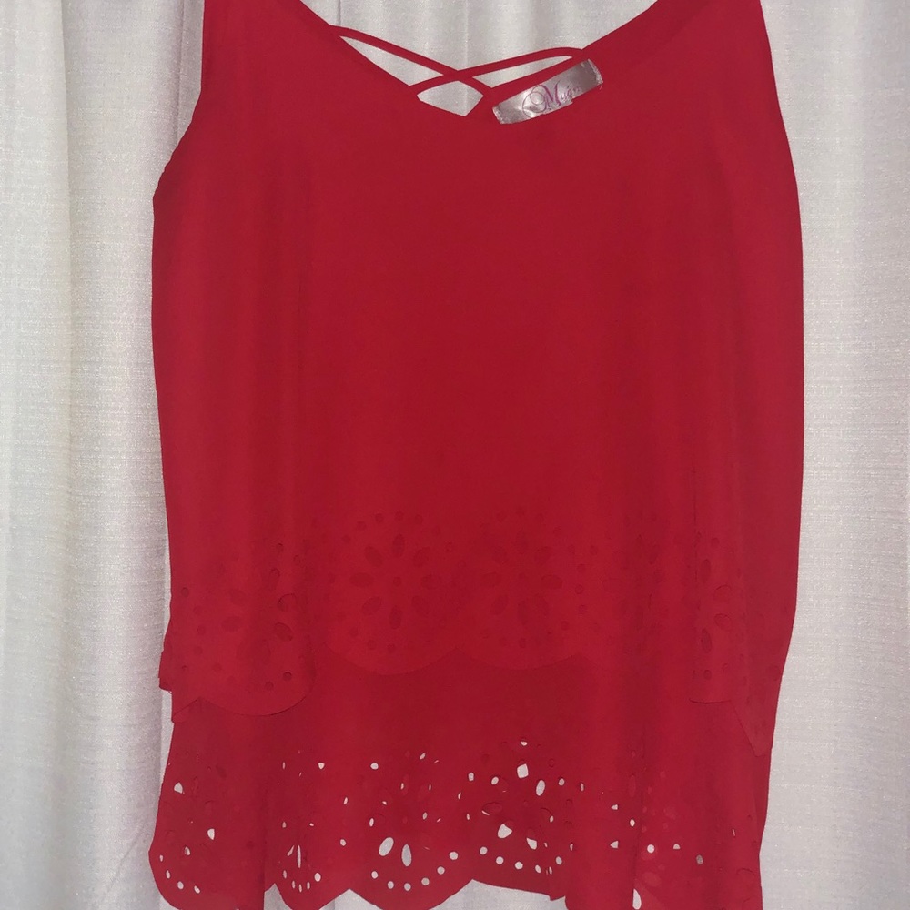 Red tank top with floral cutout on bottom